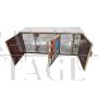 Three-door sideboard in multicolored glass with mirrored interior