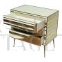 Three-drawer dresser with white and gold glass geometries