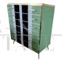 Small tallboy dresser with vertical lines in colored glass