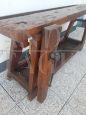 Antique carpenter's bench table from the early 19th century in oak with vice