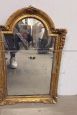 Small antique Louis Philippe mirror carved and gilded, 19th century