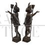 Pair of antique candlesticks with Venetian Moors in bronze, 20th century