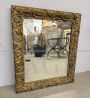 Antique gilded mirror with floral carvings, 19th century