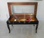 Vintage coffee table with openable showcase top