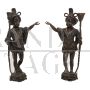 Pair of antique candlesticks with Venetian Moors in bronze, 20th century