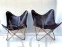 Butterfly style contemporary leather armchairs