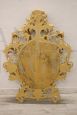 Antique baroque oval cartouche mirror in carved and gilded wood, 18th century