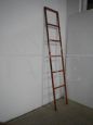 Industrial red metal ladder from the 70s