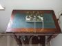 Antique inlaid coffee table with light blue velvet top