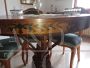 Antique round table inlaid with sculpted leg, early 19th century