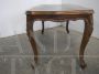 Vintage coffee table with wavy and carved legs