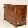 Louis Philippe capuchin chest of drawers in carved walnut, 19th century Italy