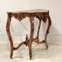 Antique Louis Philippe console table in richly carved walnut