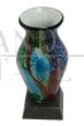 Polychrome glass vase with marble base