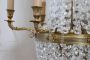 Antique chandelier from the late 19th century in gilded bronze with crystal drops