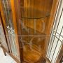 1940s art deco rounded display cabinet in inlaid oak with beveled glasses