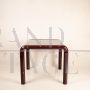 Orsay 54A table by Gae Aulenti for Knoll with glass top, burgundy color