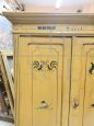 Decorated small vintage wardrobe from the early 20th century