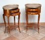 Pair of antique oval bedside tables with two drawers with inlays and bronzes