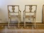 Pair of 18th century lacquered and gilded chairs with Vienna straw seats