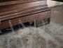 Large 1950s walnut bookcase with leaded glasses