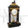 Antique pendulum clock from the Directoire period in gilded bronze and marble