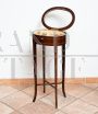 English Art Nouveau side table with glass top and sewing tools