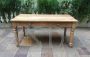 Rustic style dining table in natural wood