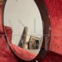 Vintage 1970s oval mirror with green glass frame