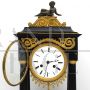 Antique pendulum clock from the Directoire period in gilded bronze and marble