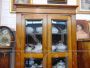 Vintage display cabinet glass cupboard in oak, with beveled glasses