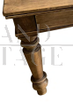 Rustic table from the late 19th century with drawers and turned legs