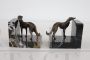 Pair of Art Deco bookends with greyhound dogs in bronze and Portoro marble