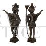 Pair of antique candlesticks with Venetian Moors in bronze, 20th century