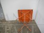 Vintage orange lacquered iron garden table, 1970s