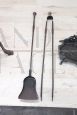 Set of antique fireplace tools in wrought iron and cast iron, early 19th century