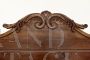 18th century bench in walnut carved with floral motifs