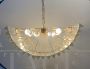 Horizontal chandelier in Murano glass and brass