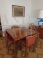 Extendable square table in solid walnut + 4 leather chairs, Italy 1970s