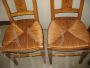 Set of 4 antique style honey walnut chairs with straw seat