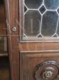 Large 1950s walnut bookcase with leaded glasses