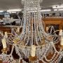 Early 1900s 8-light chandelier in gold metal with crystal drops