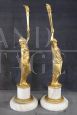 Pair of sculptural female figures in gilded bronze and alabaster