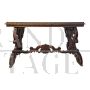 Antique carved desk table with studded leather top