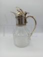 Vintage glass carafe with silver handle