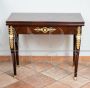 French Empire game table in mahogany feather