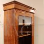 Antique Louis Philippe capuchin walnut display cabinet bookcase from the 19th century