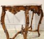 Antique Louis Philippe console table in richly carved walnut