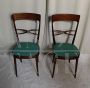 Pair of Melchiorre Bega chairs in green skai leather, 1950s