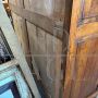 Large antique wardrobe from the early 19th century in walnut with diamond carved doors